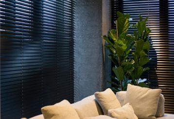 Faux wood blinds installed in an elegant living room